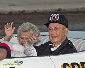 Eldora founders Earl and Berneice Baltes wave to the crowd during opening ceremonies at the Baltes Classic.