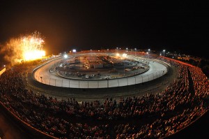 Dirt Late Models go '4-wide' in a salute to the fans prior to the start of the World 100 in September