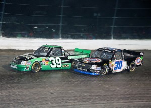 Kyle Larson (30) came up just short to Austin Dillon (39) in the inaugural 1-800  CarCash MudSummer Classic